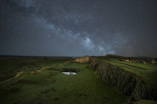 <span class="photo-credit"> Walltown Crags at night. Image courtesy of <a href="https://www.northumberlandnationalpark.org.uk" target="_blank">Northumberland National Park</a>. </span>